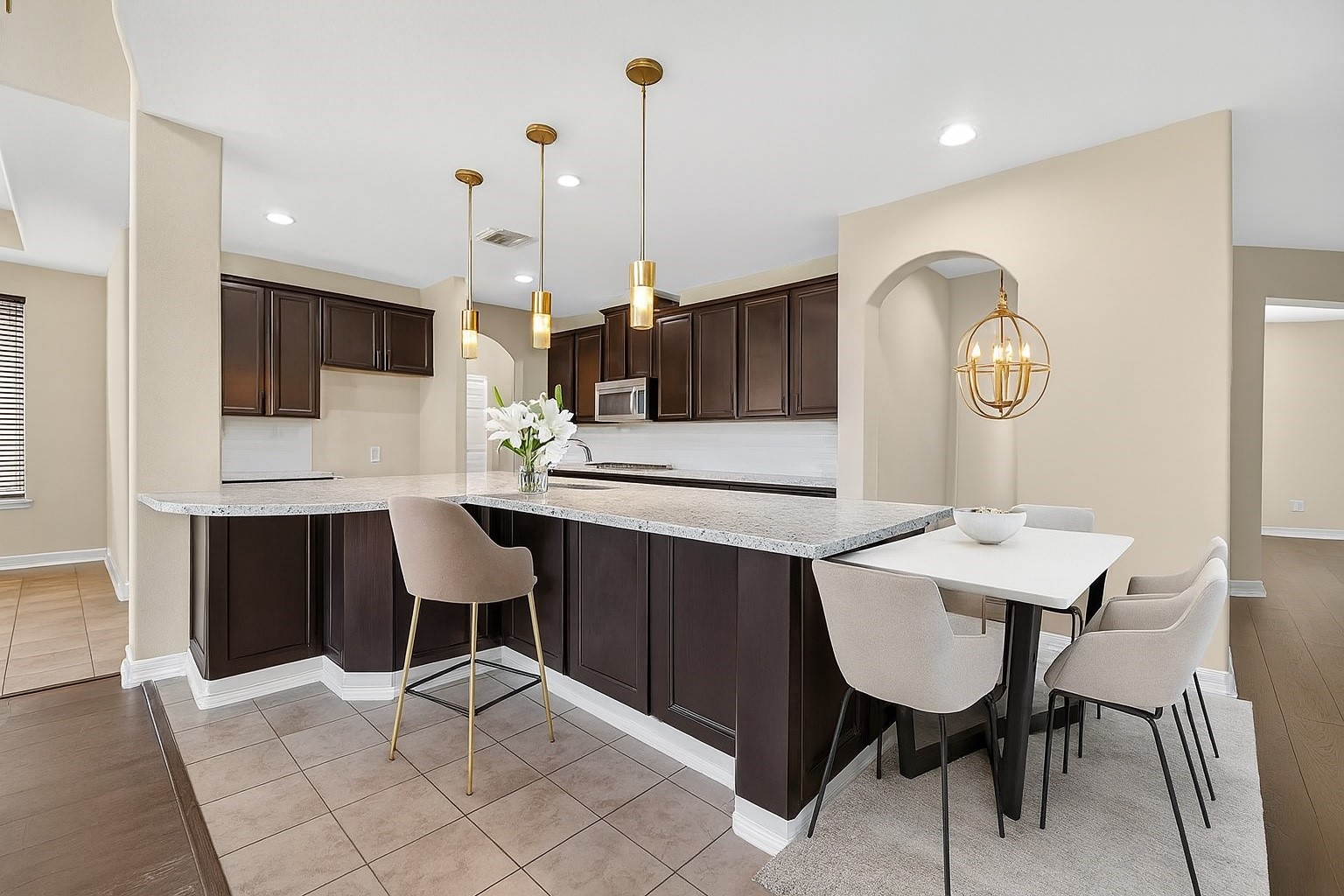 22743 Adrift Row Lane Porter, TX 77365 - Photo 12 of 33 a kitchen with a sink cabinets and wooden floor