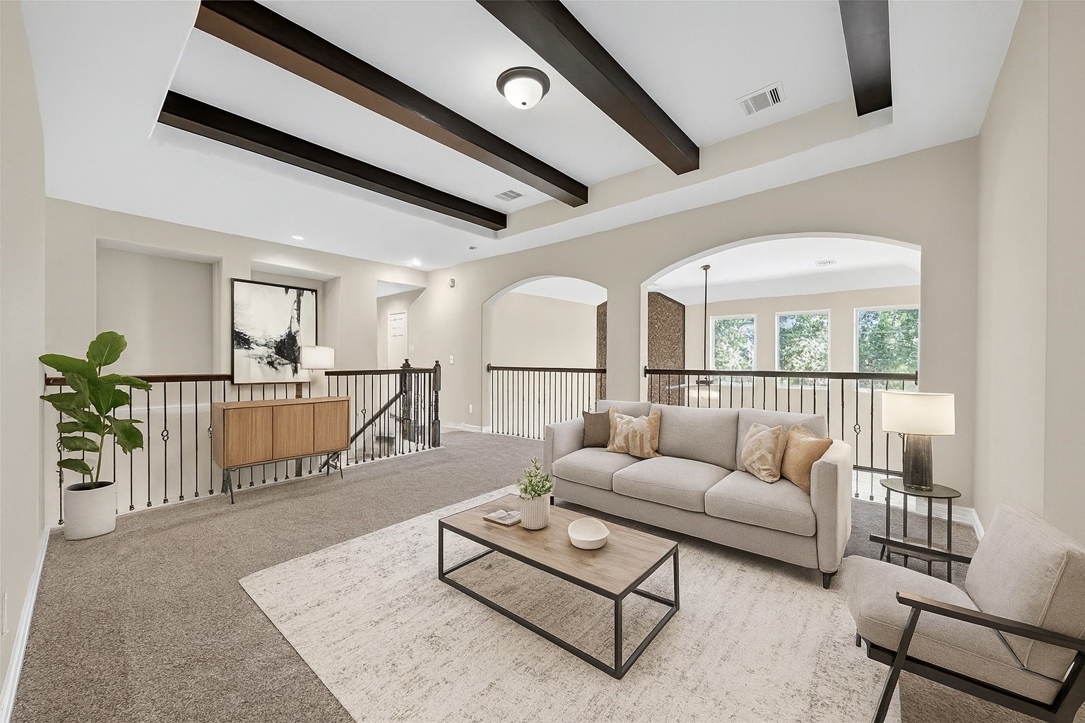 22743 Adrift Row Lane Porter, TX 77365 - Photo 14 of 33 a living room with furniture a wooden floor and a large window