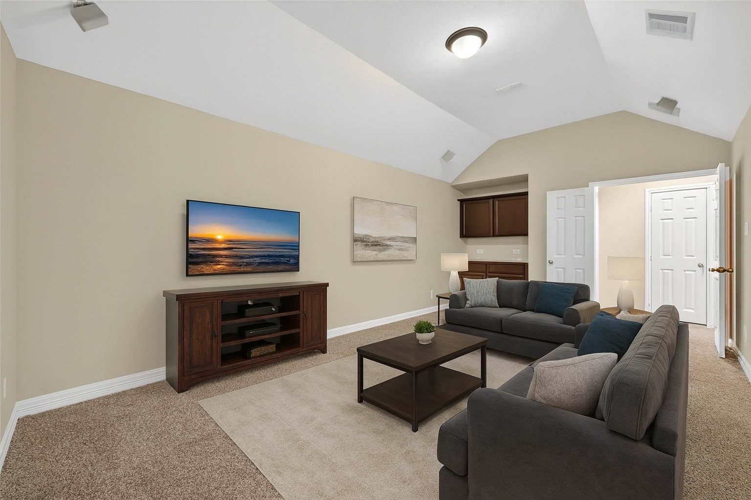 22743 Adrift Row Lane Porter, TX 77365 - Photo 15 of 33 a living room with furniture and a flat screen tv