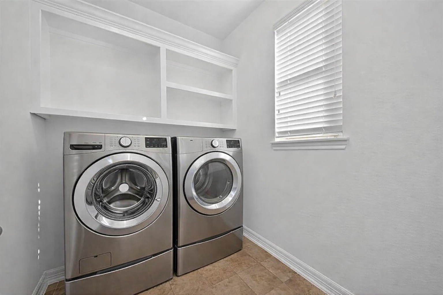 22743 Adrift Row Lane Porter, TX 77365 - Photo 19 of 33 a utility room with dryer and washer