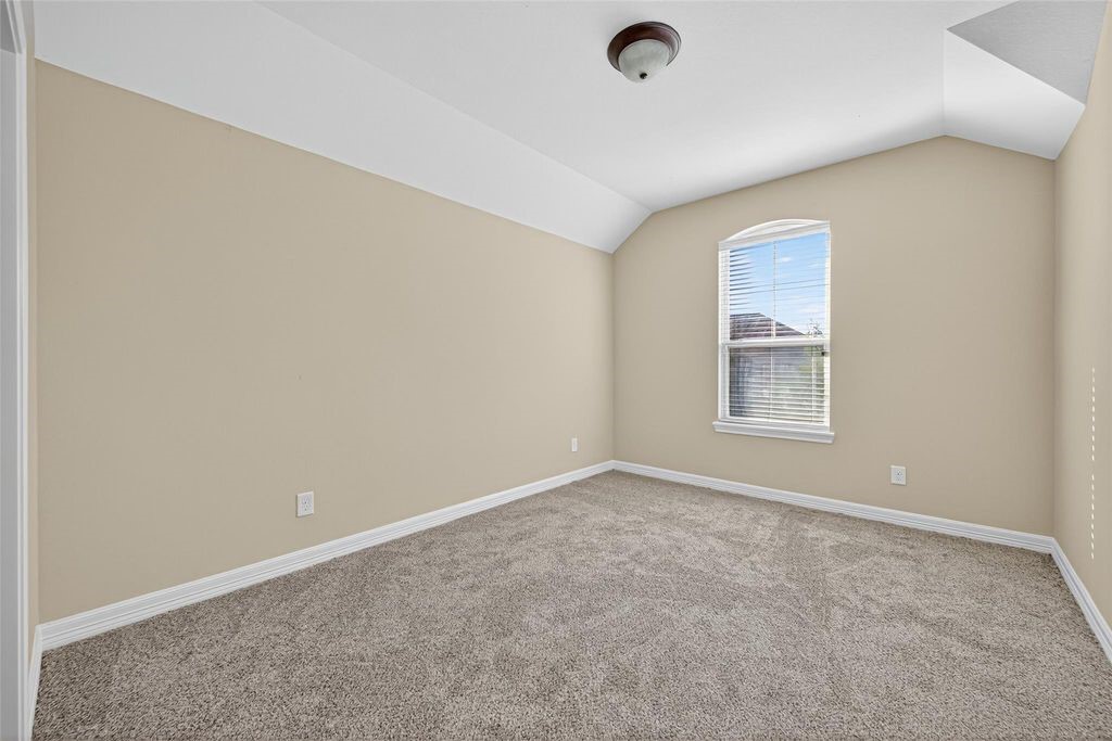 22743 Adrift Row Lane Porter, TX 77365 - Photo 21 of 33 an empty room with windows