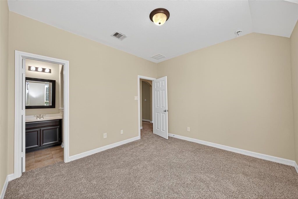 22743 Adrift Row Lane Porter, TX 77365 - Photo 24 of 33 an empty room with a bathroom and a sink