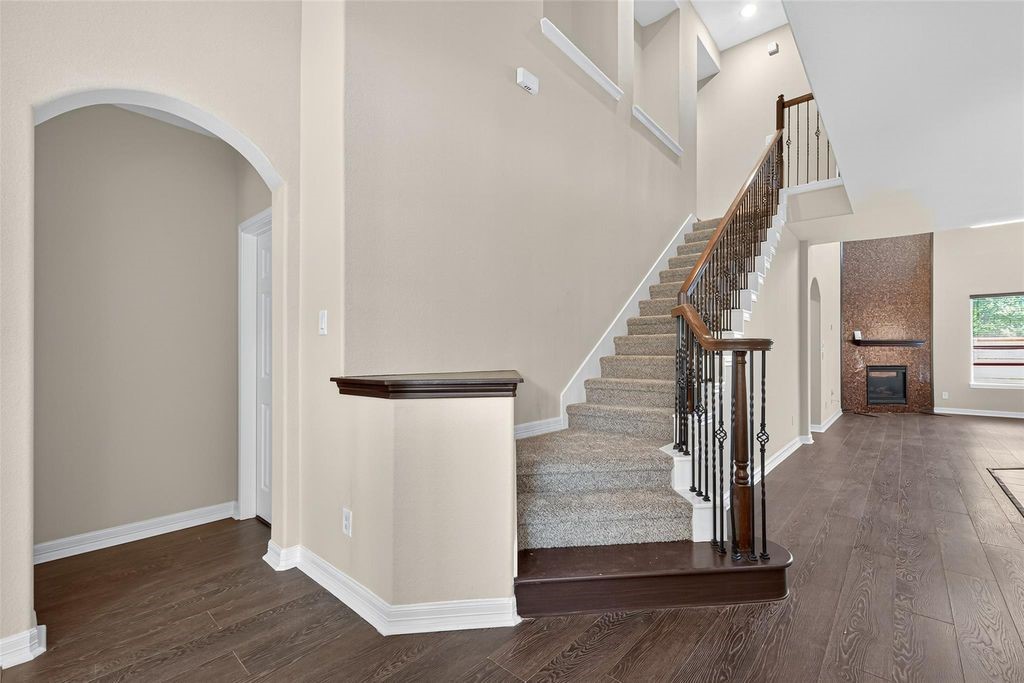 22743 Adrift Row Lane Porter, TX 77365 - Photo 9 of 33 a view of entryway and hall with wooden floor