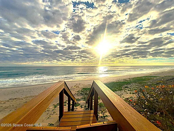 a view of an ocean from a terrace