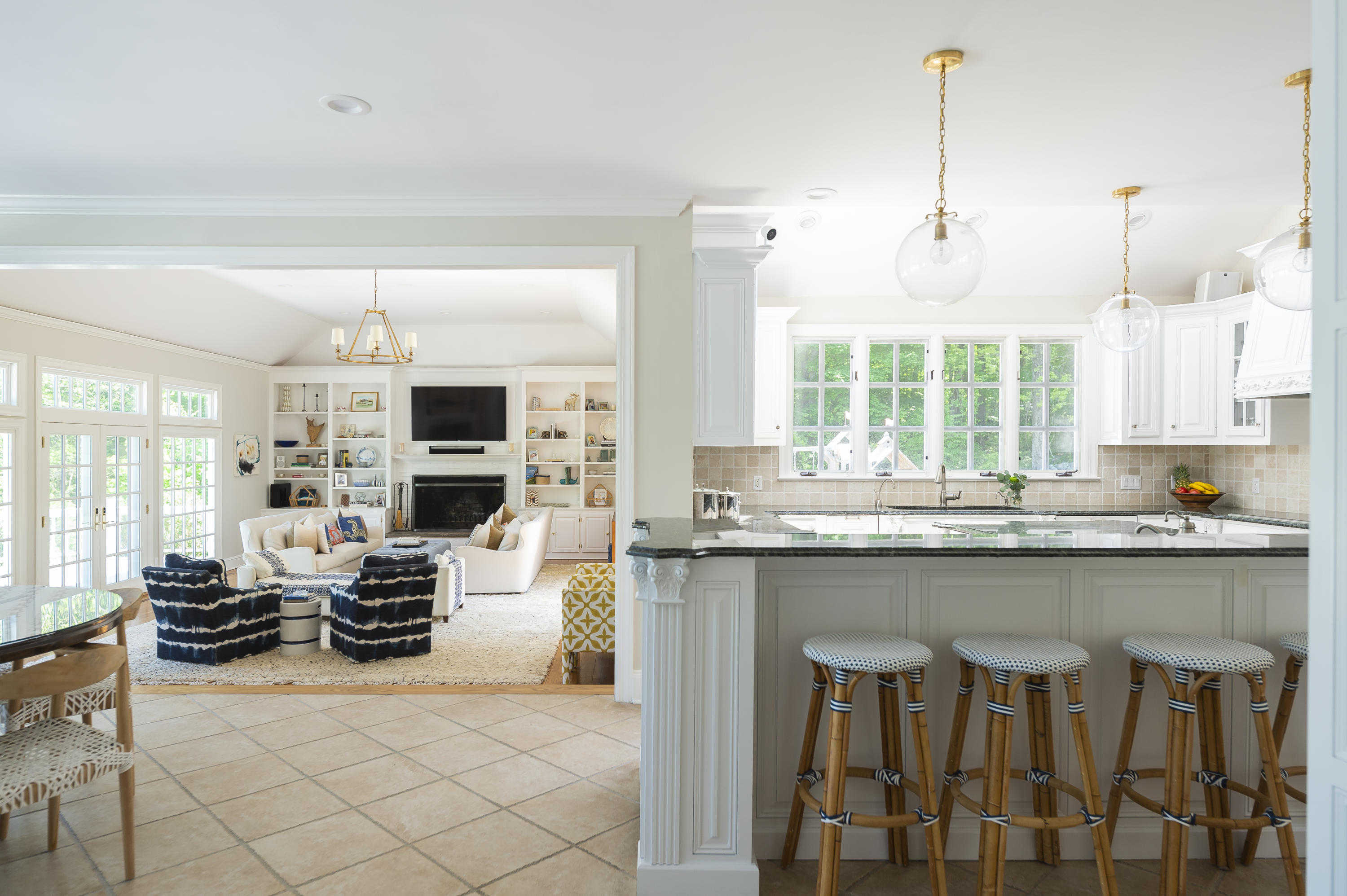 465 North Wilton Road New Canaan, CT 06840 - Photo 32 of 64 a kitchen with stainless steel appliances granite countertop a stove top oven a sink dishwasher and white cabinets with wooden floor