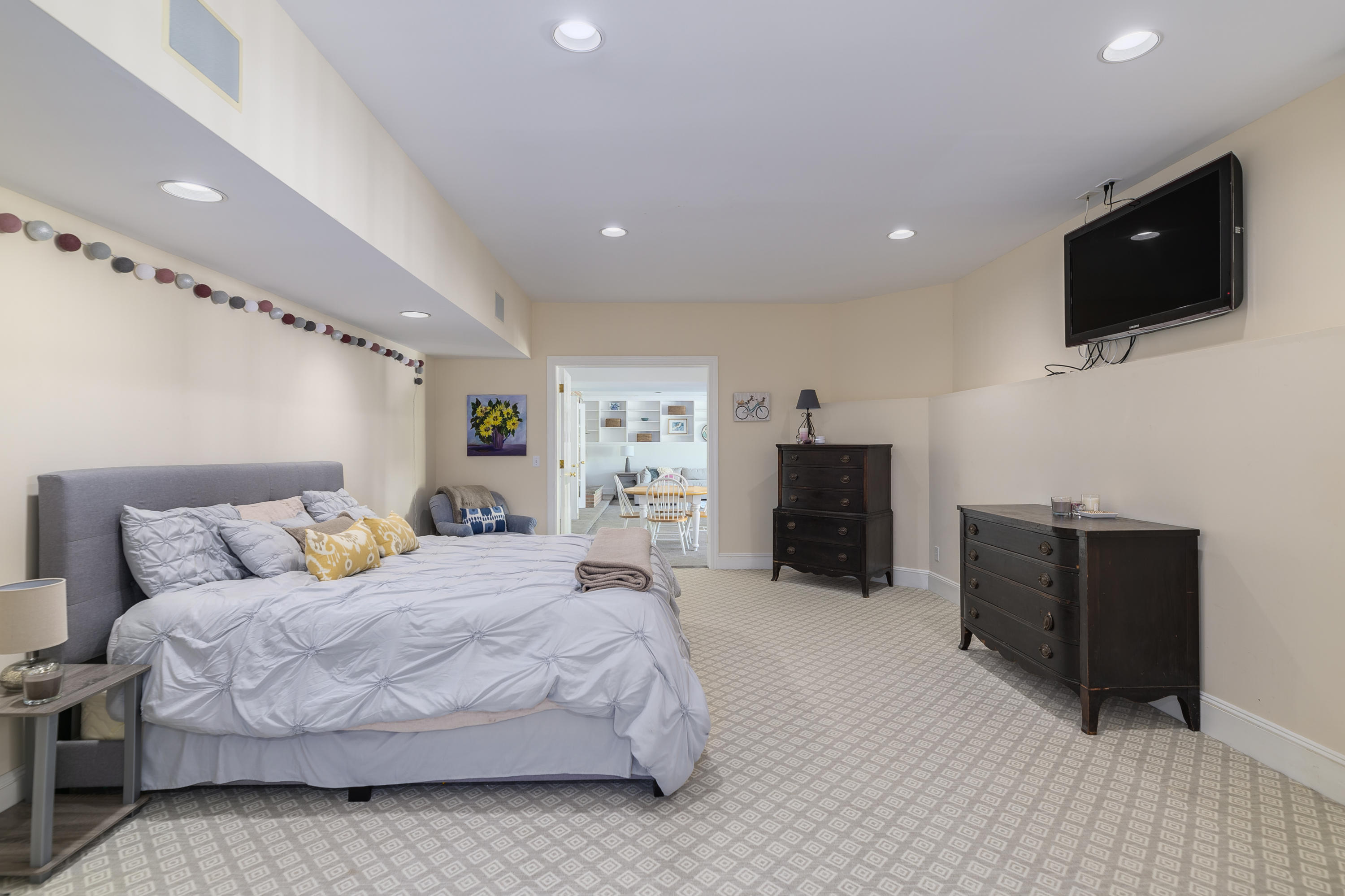 465 North Wilton Road New Canaan, CT 06840 - Photo 34 of 64 a bedroom with a bed and a flat screen television