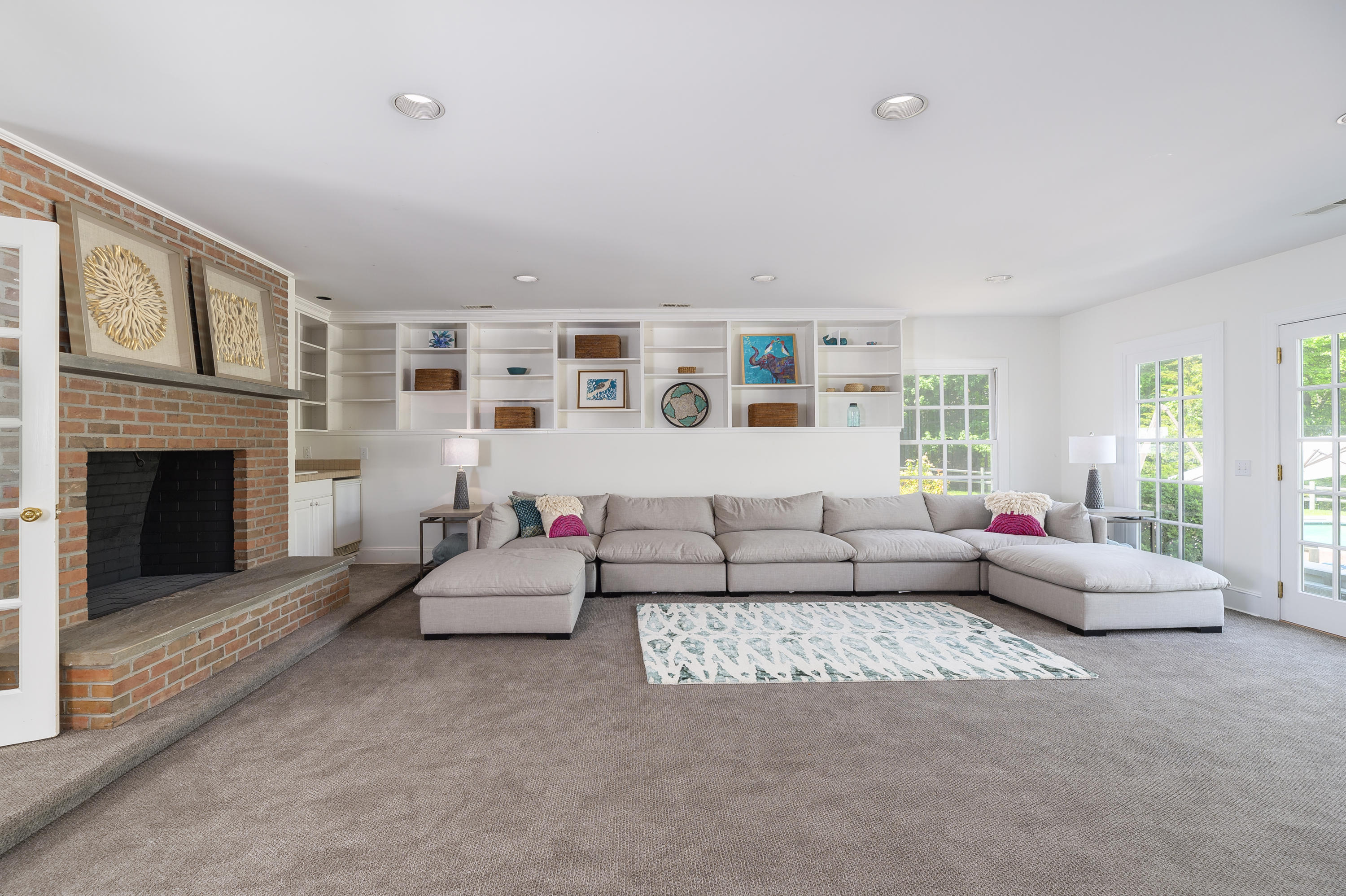 465 North Wilton Road New Canaan, CT 06840 - Photo 36 of 64 a living room with furniture and fireplace