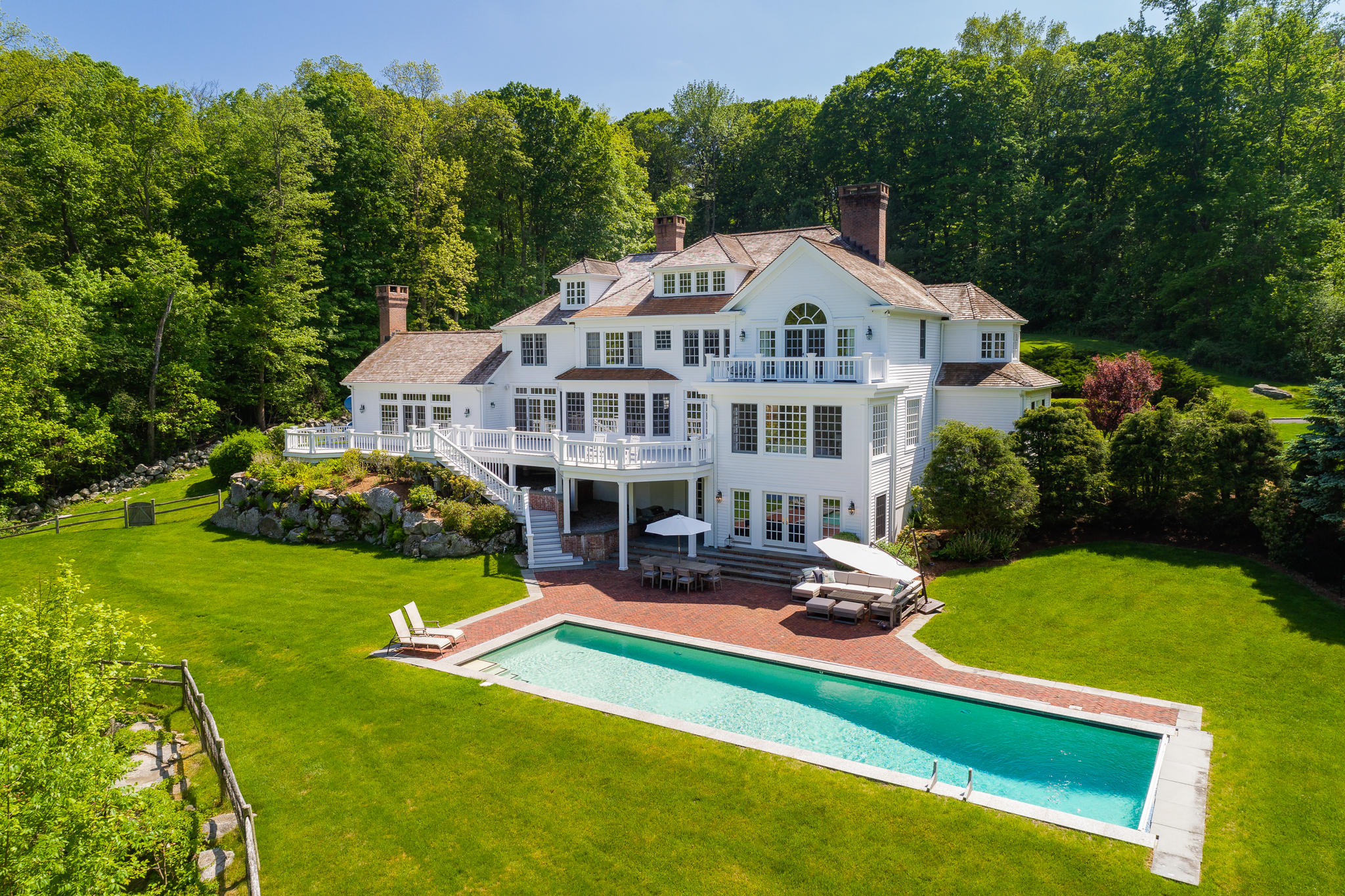 465 North Wilton Road New Canaan, CT 06840 - Photo 63 of 64 a swimming pool with outdoor seating and yard