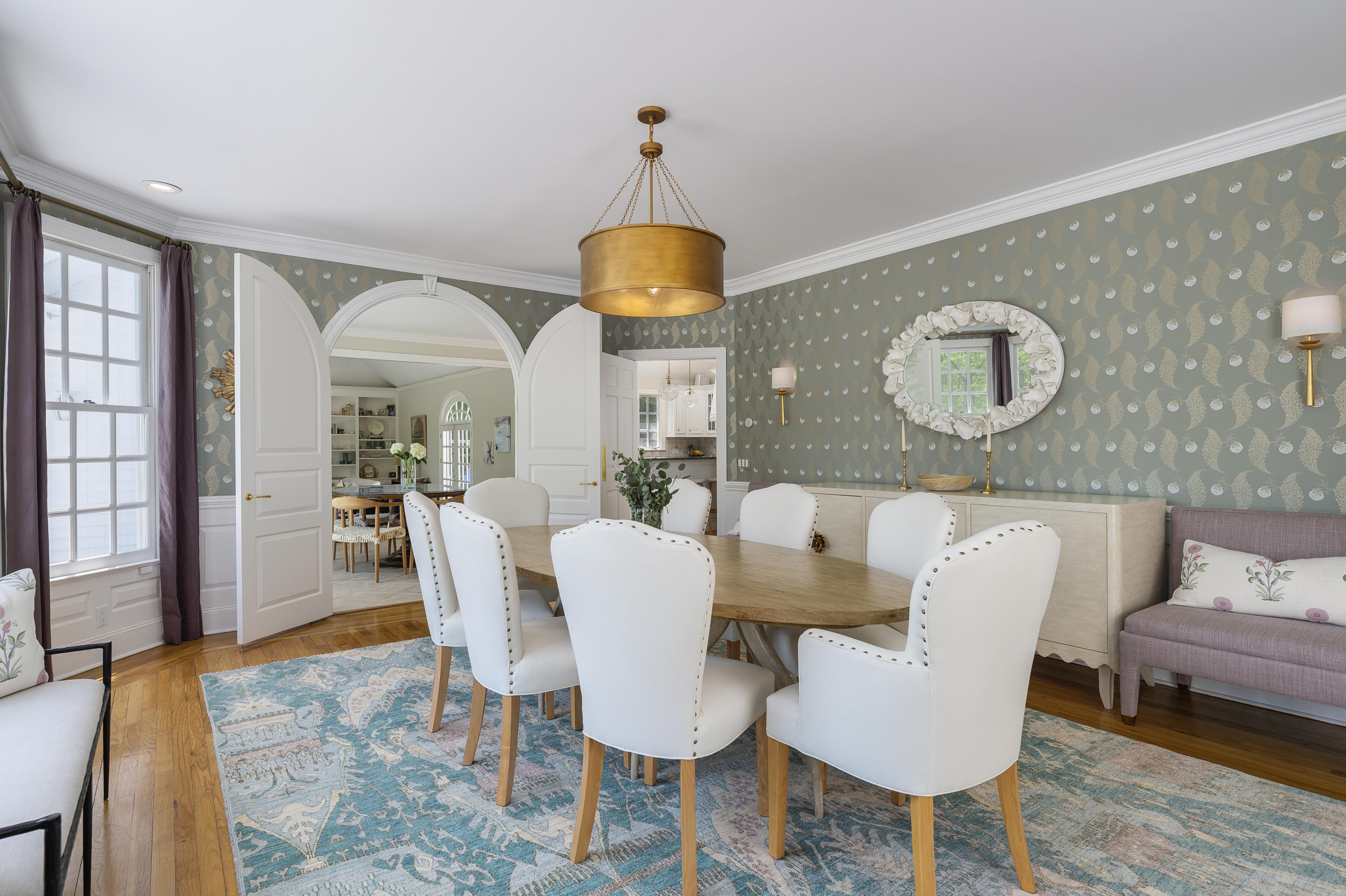 465 North Wilton Road New Canaan, CT 06840 - Photo 10 of 64 a view of a dining room with furniture and wooden floor