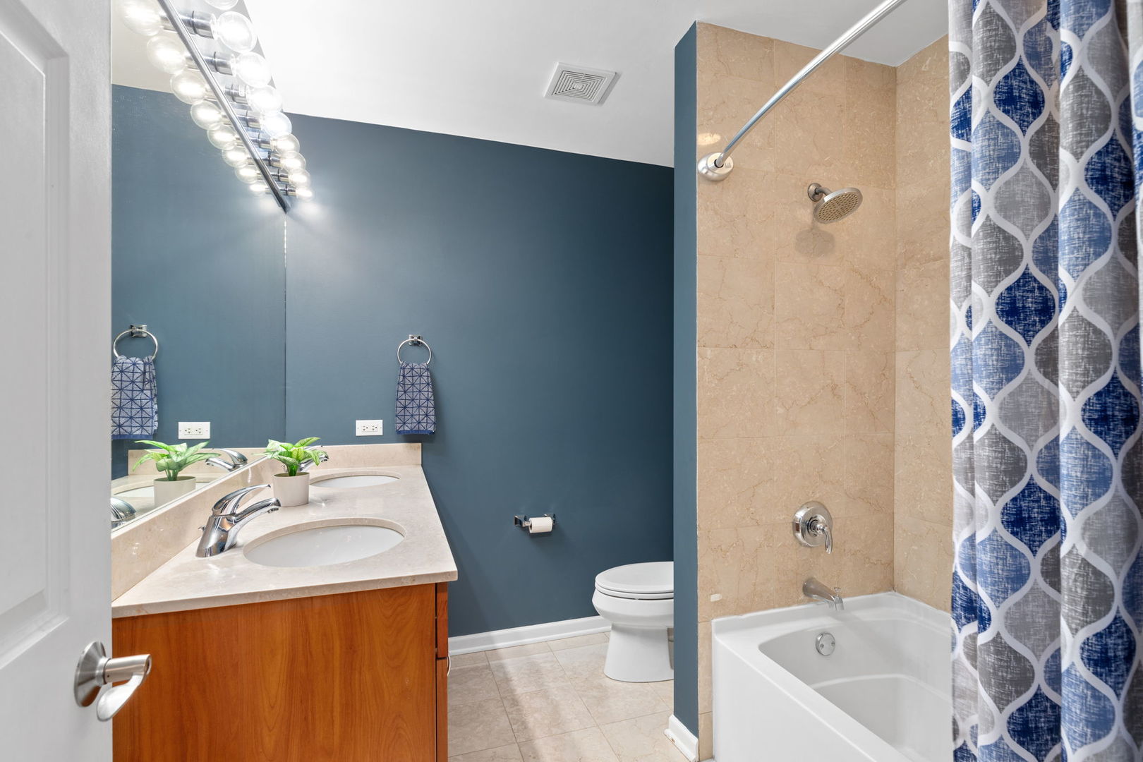 657 West Fulton Street, Unit 705 Chicago, IL 60661 - Photo 16 of 24 a bathroom with a sink toilet and shower