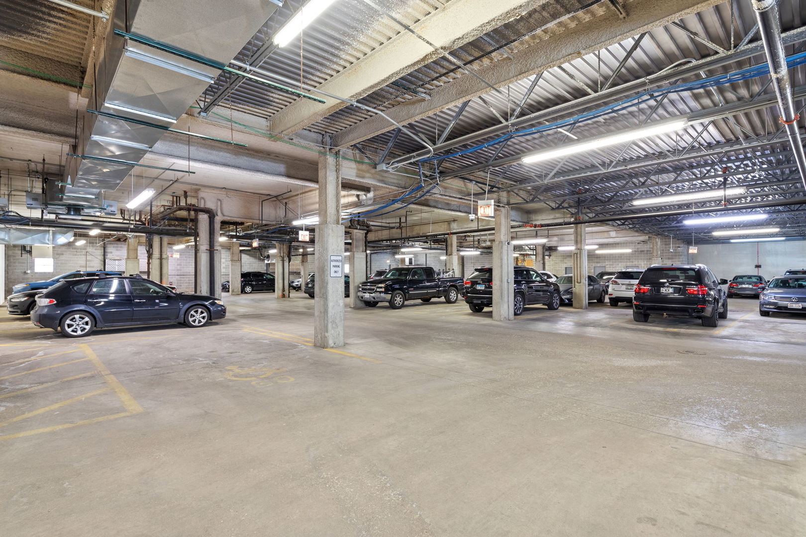 657 West Fulton Street, Unit 705 Chicago, IL 60661 - Photo 24 of 24 a view of cars parked in a parking