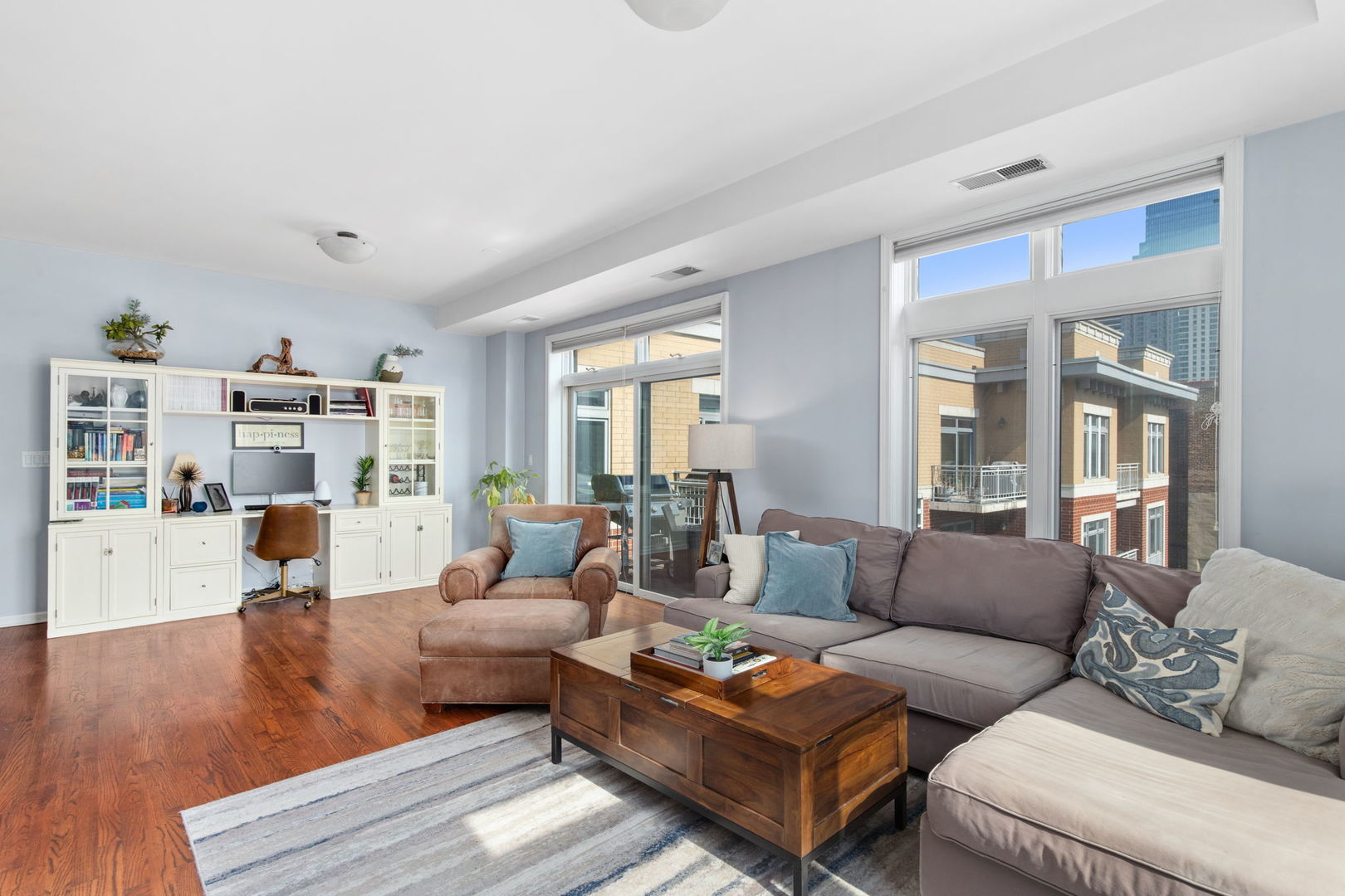 657 West Fulton Street, Unit 705 Chicago, IL 60661 - Photo 5 of 24 a living room with furniture and a large window