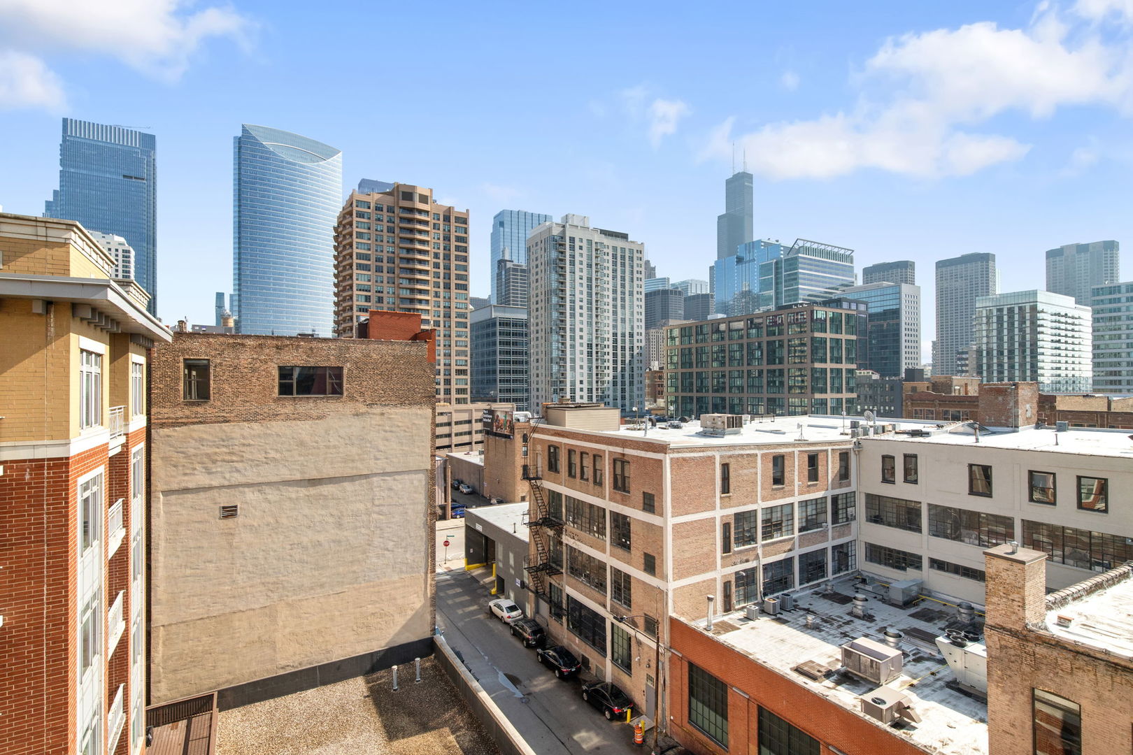 657 West Fulton Street, Unit 705 Chicago, IL 60661 - Photo 8 of 24 a view of a city that has tall buildings