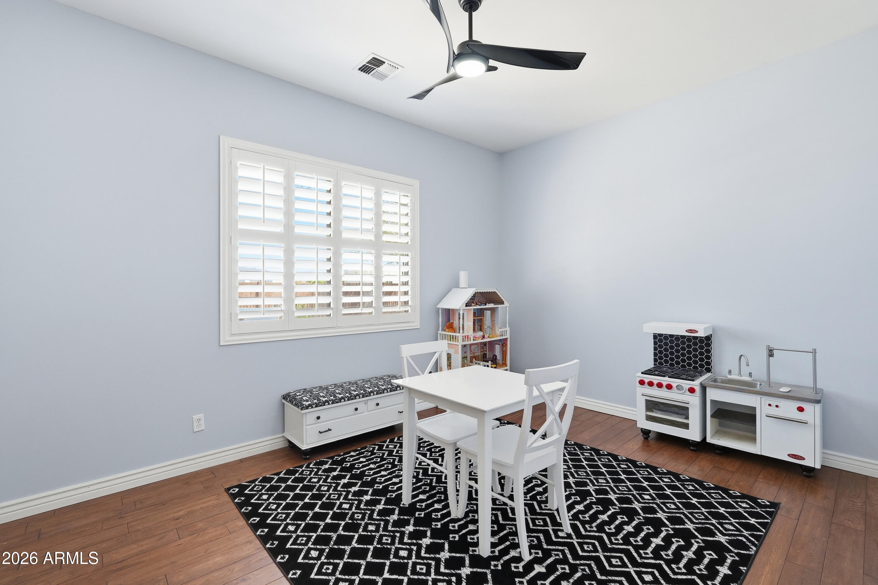 2616 West Canyon Road Phoenix, AZ 85086 - Photo 21 of 45 a living room with furniture and a window