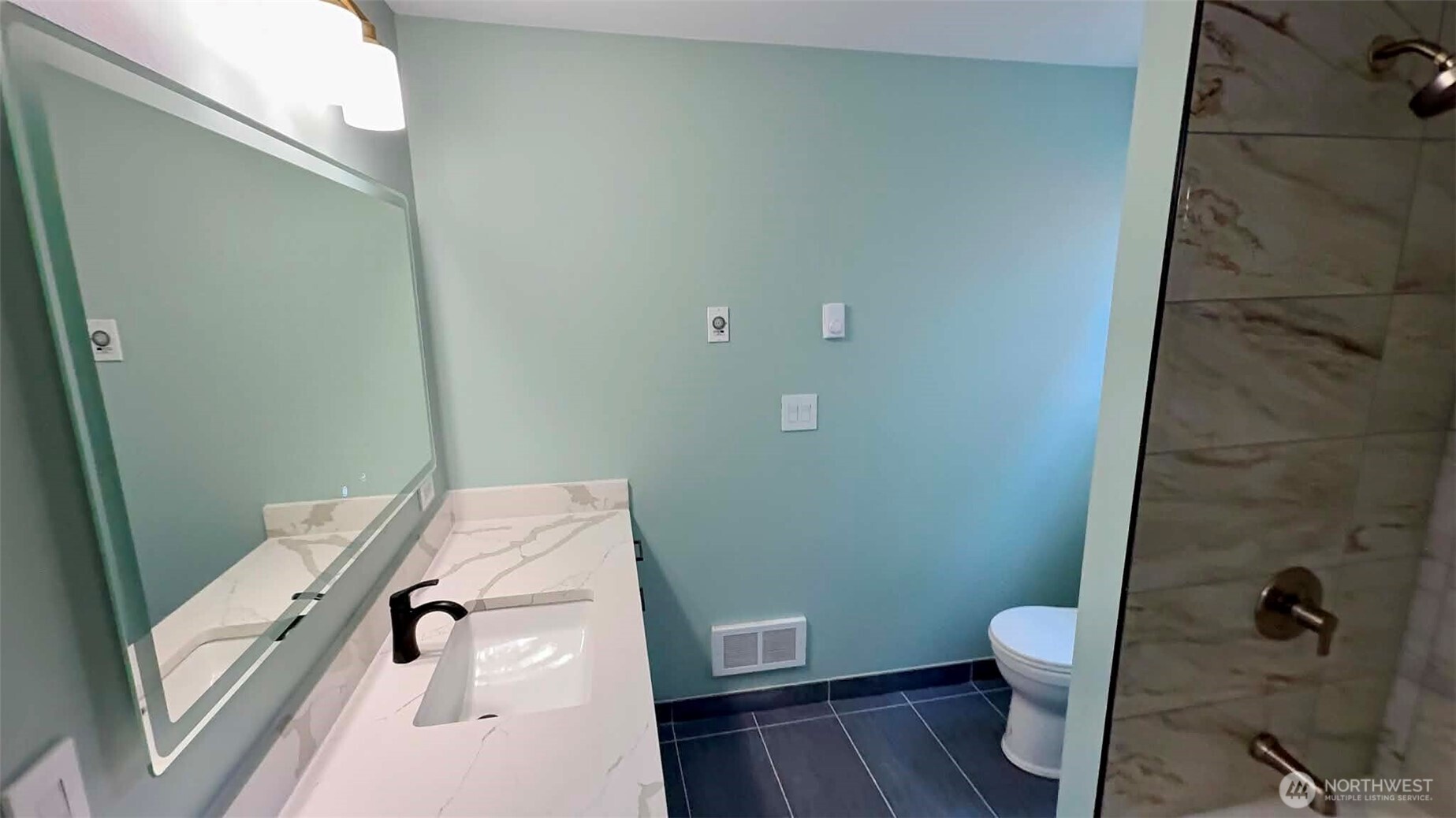 9040 17th Avenue Southwest Seattle, WA 98106 - Photo 23 of 34 a bathroom with a toilet