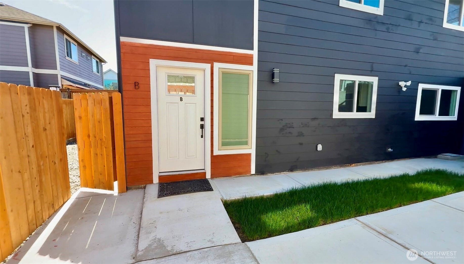9040 17th Avenue Southwest Seattle, WA 98106 - Photo 3 of 34 a house view with a garden space
