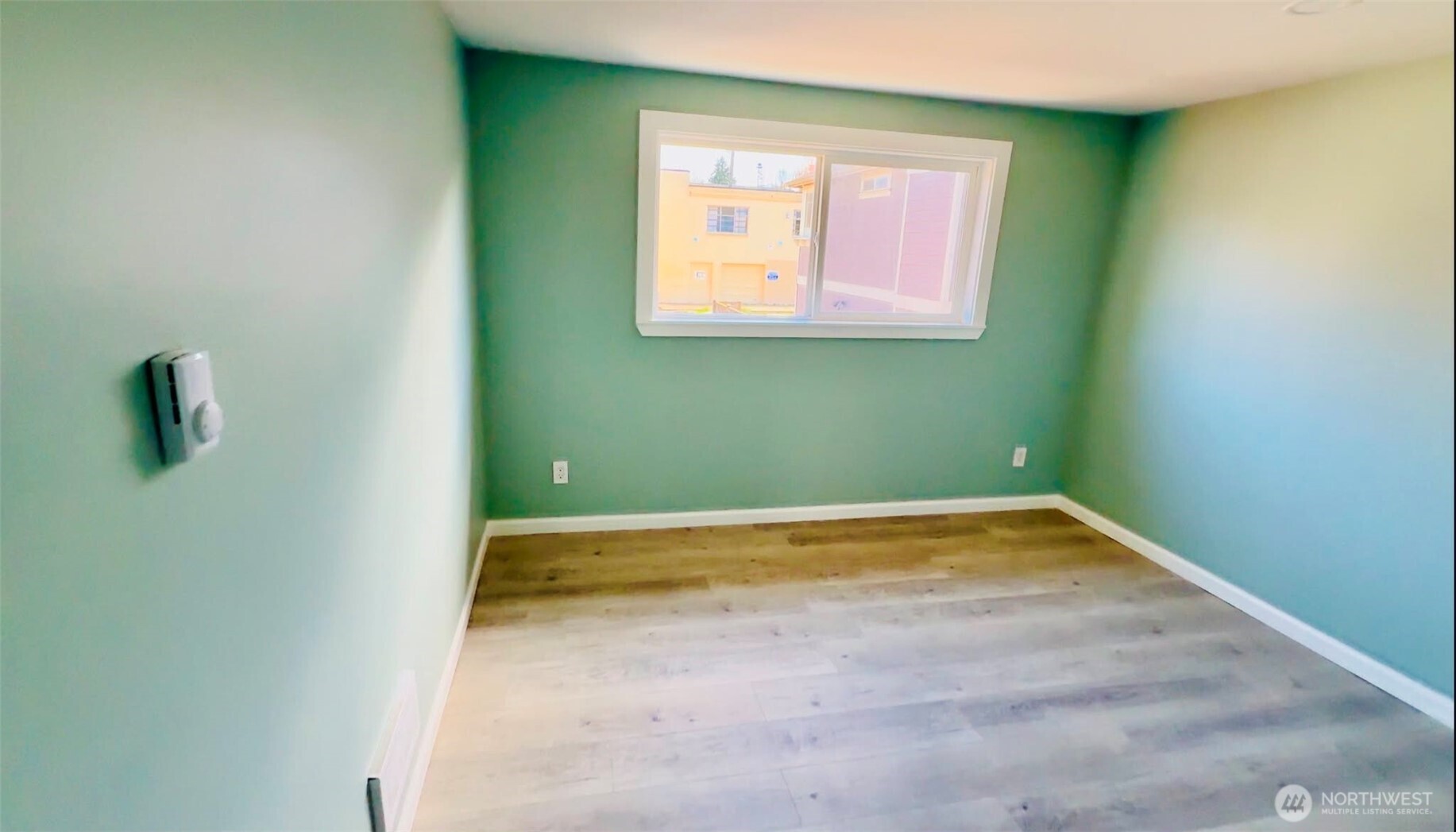 9040 17th Avenue Southwest Seattle, WA 98106 - Photo 7 of 34 a view of a room with window
