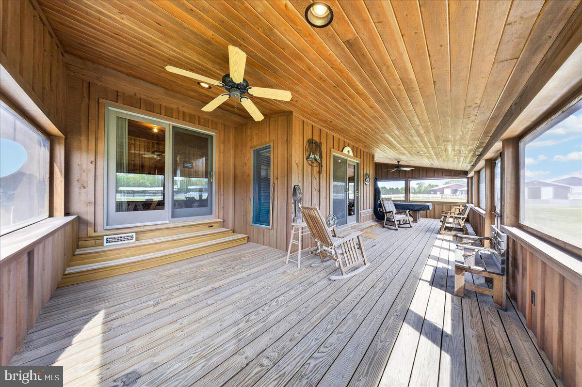 10036 Redden Road Bridgeville, DE 19933 - Photo 39 of 53 a view of a patio with wooden floor