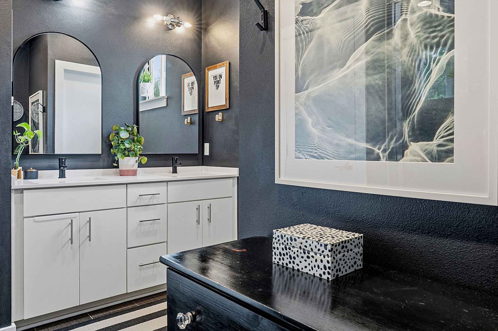 3001 Del Curto Road, Unit 31 Austin, TX 78704 - Photo 22 of 32 a bathroom with a sink and a mirror