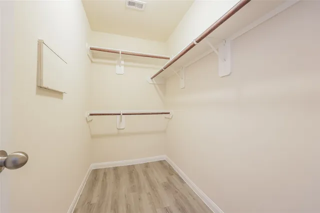 a view of small space with racks on the wall