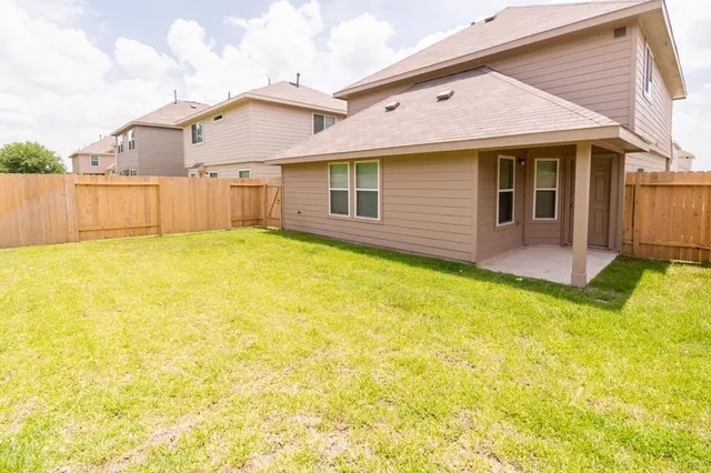 a front view of house with yard and seating area