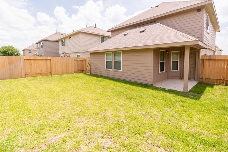 4114 Farmers Pass Road Houston, TX 77014 - Photo 2 of 15 a front view of house with yard and seating area