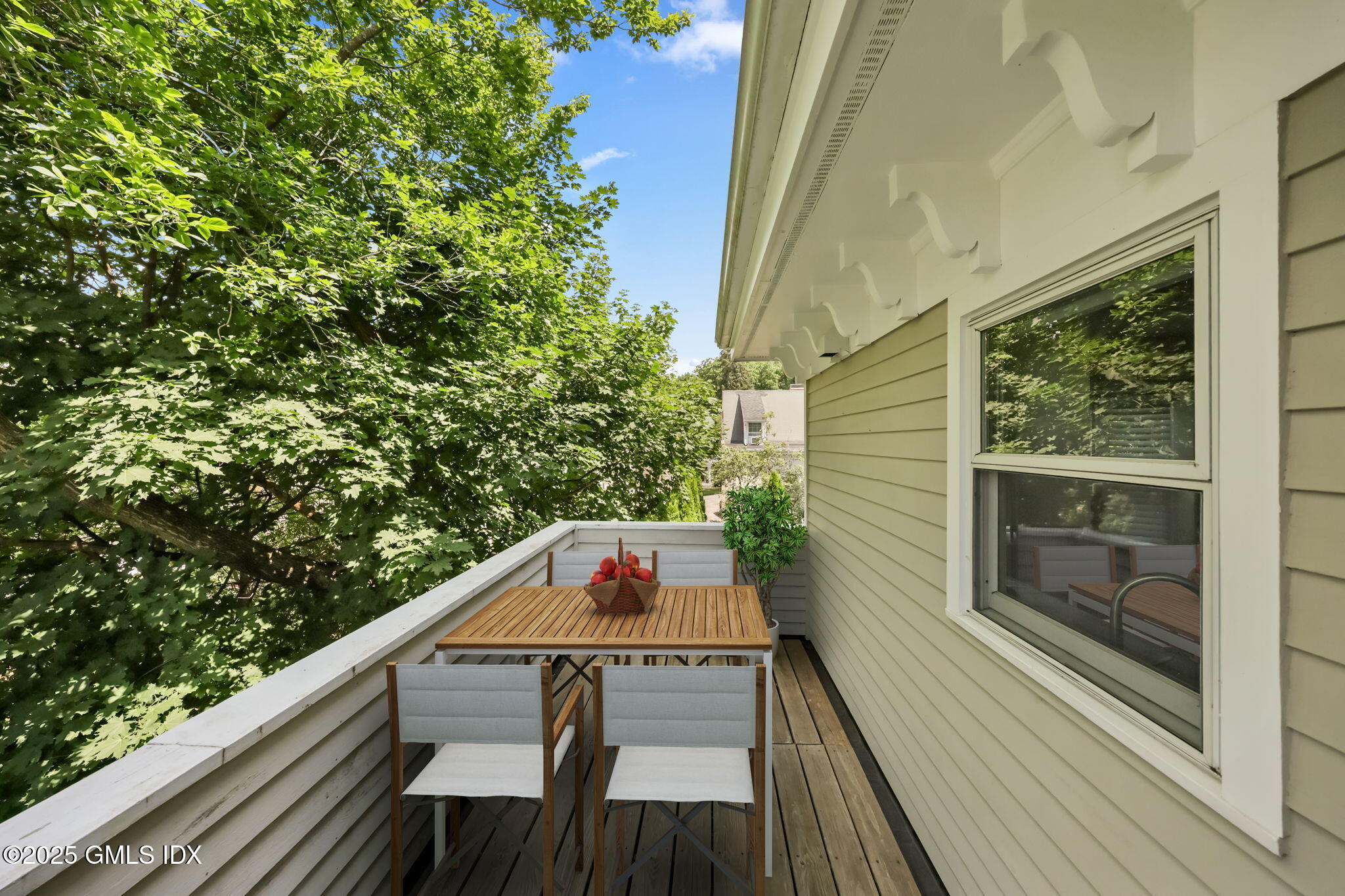 172 Field Point Road, Unit 9 Greenwich, CT 06830 - Photo 19 of 20 a balcony with wooden floor and outdoor space
