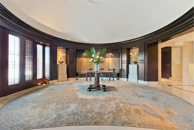 a view of a lobby with furniture and windows