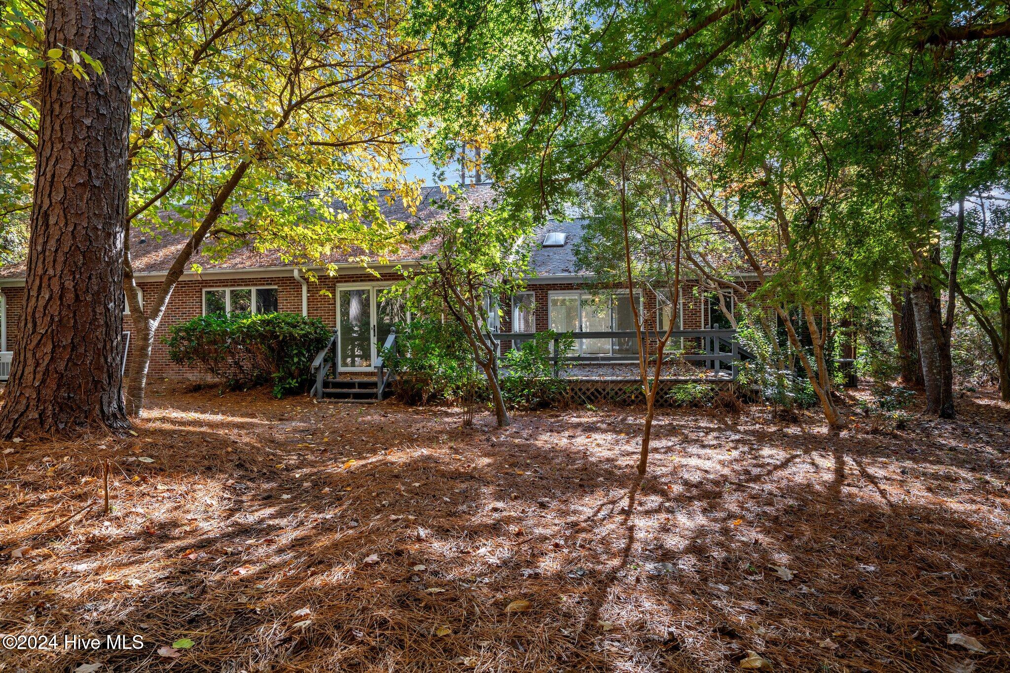 560 South Bethesda Road Southern Pines, NC 28387 - Photo 9 of 53 View of the home from the backcenter.