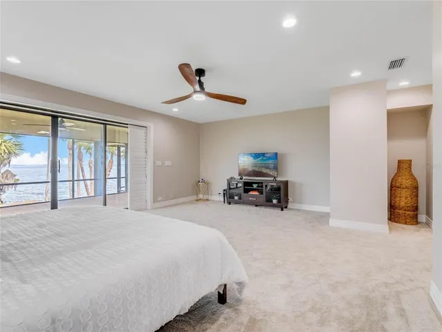 a bathroom with a toilet a sink and a mirror