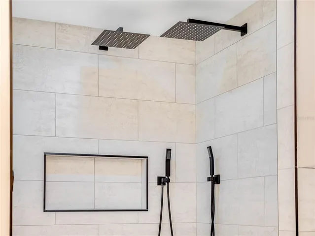 a view of a house with a yard and plants