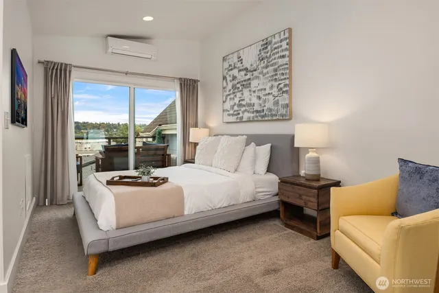 a bed room with a bed and a couch