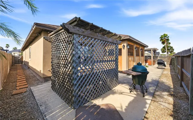 a view of swimming pool with outdoor seating
