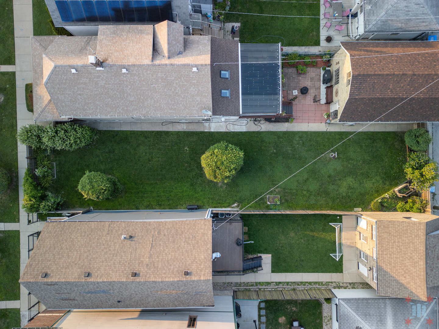 an aerial view of house with yard