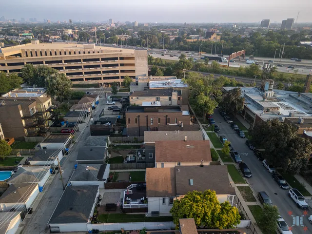 an aerial view of a house with a garden