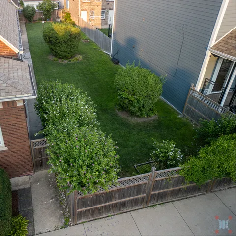 a backyard of a house with lots of green space