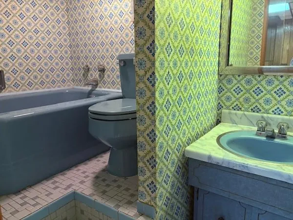 a bathroom with a sink and a toilet