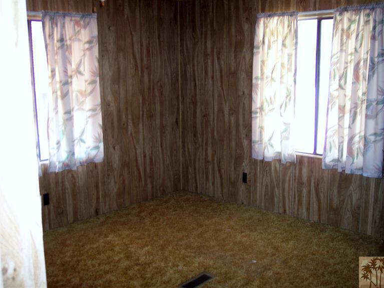 18555 Roberts Road, Unit 36 Desert Hot Springs, CA 92241 - Photo 15 of 20 a view of an empty room and window