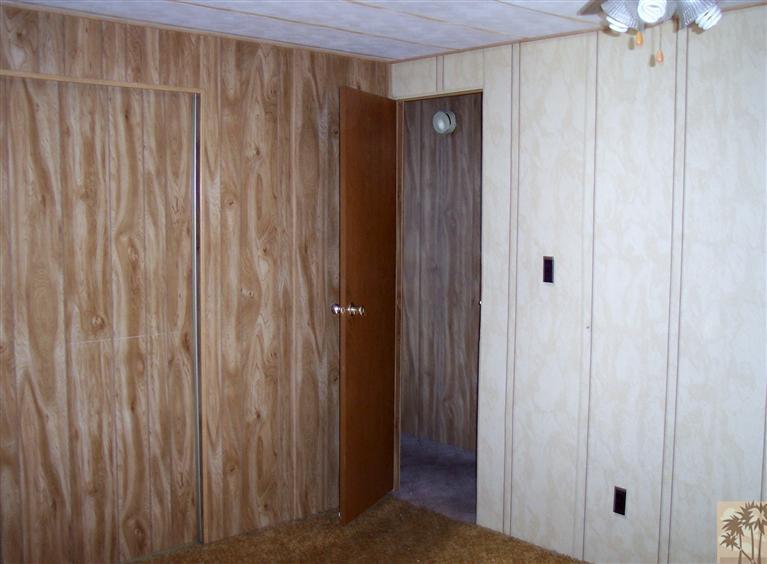 18555 Roberts Road, Unit 36 Desert Hot Springs, CA 92241 - Photo 16 of 20 a view of a bathroom with a shower and a window