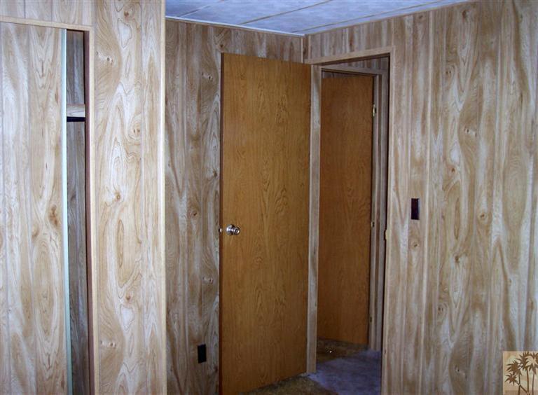 18555 Roberts Road, Unit 36 Desert Hot Springs, CA 92241 - Photo 18 of 20 a bathroom with a shower and a door