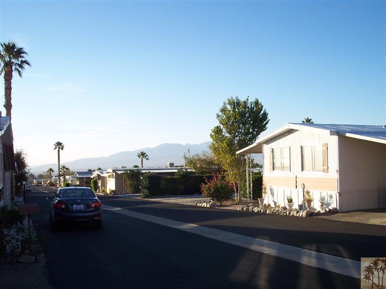 18555 Roberts Road, Unit 36 Desert Hot Springs, CA 92241 - Photo 4 of 20 a view of a city street from a balcony