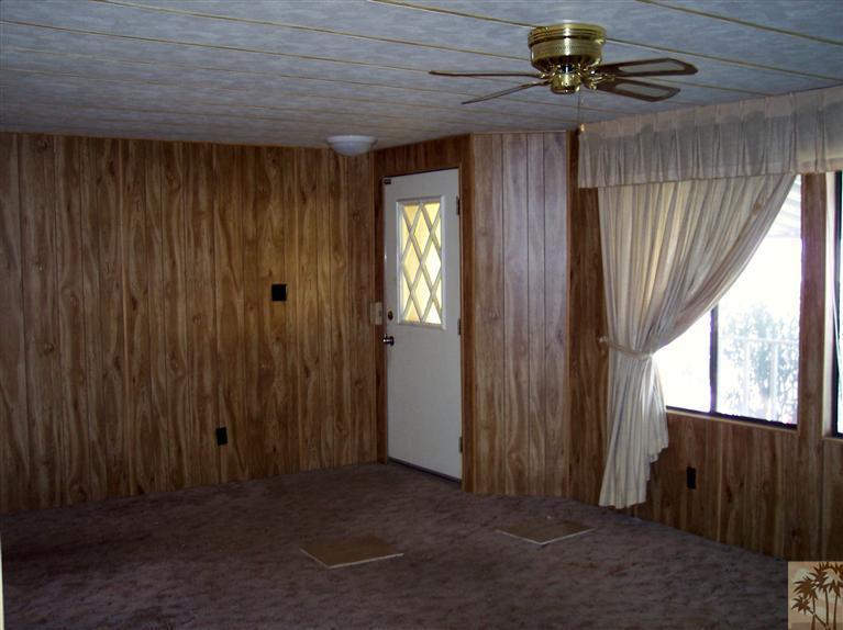 18555 Roberts Road, Unit 36 Desert Hot Springs, CA 92241 - Photo 5 of 20 a view of a livingroom with a window