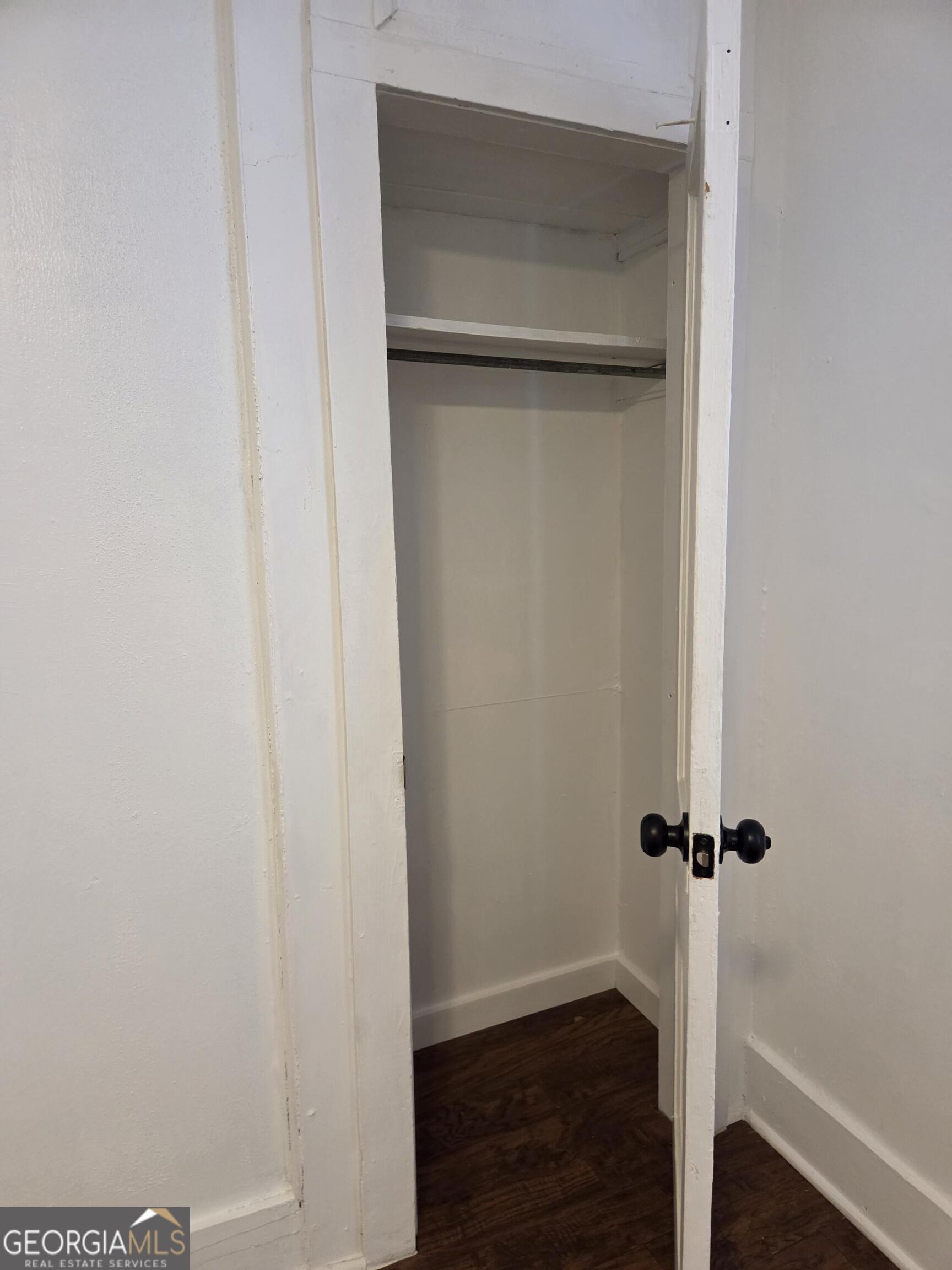 1502 Monck Street Brunswick, GA 31520 - Photo 16 of 32 a view of a hallway with wooden floor