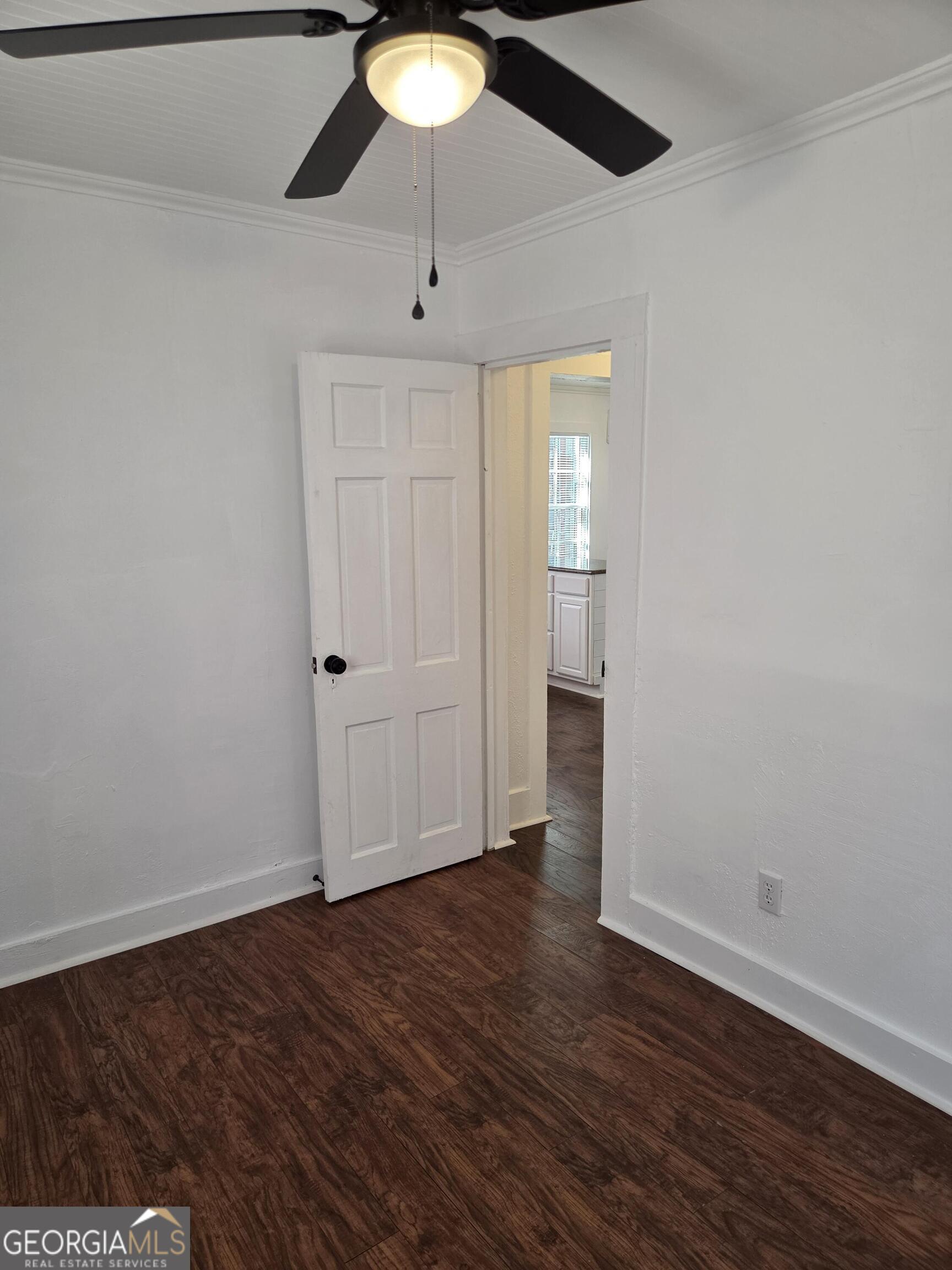 1502 Monck Street Brunswick, GA 31520 - Photo 20 of 32 a view of an empty room with wooden floor