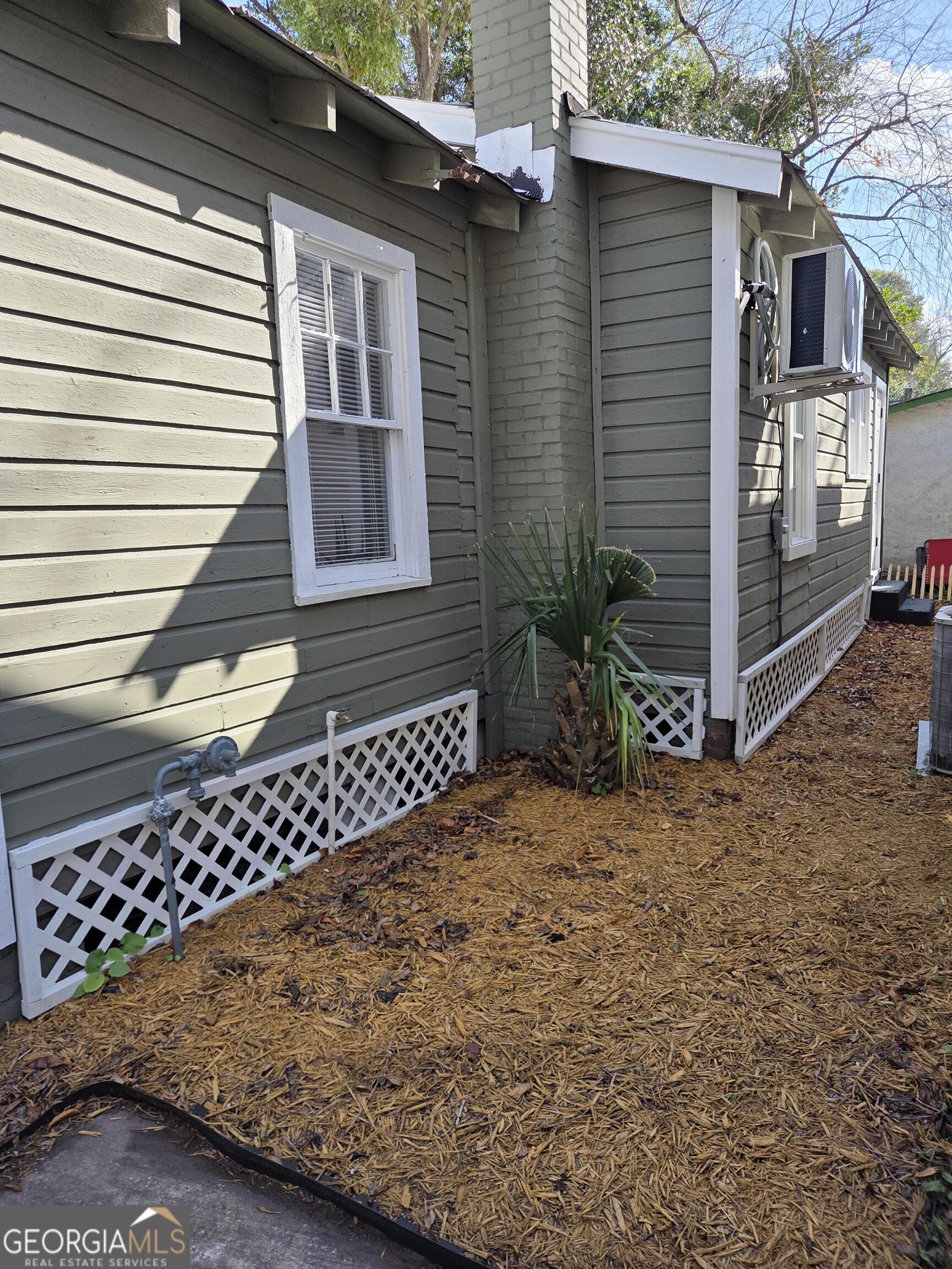 1502 Monck Street Brunswick, GA 31520 - Photo 26 of 32 a view of a house with a small yard