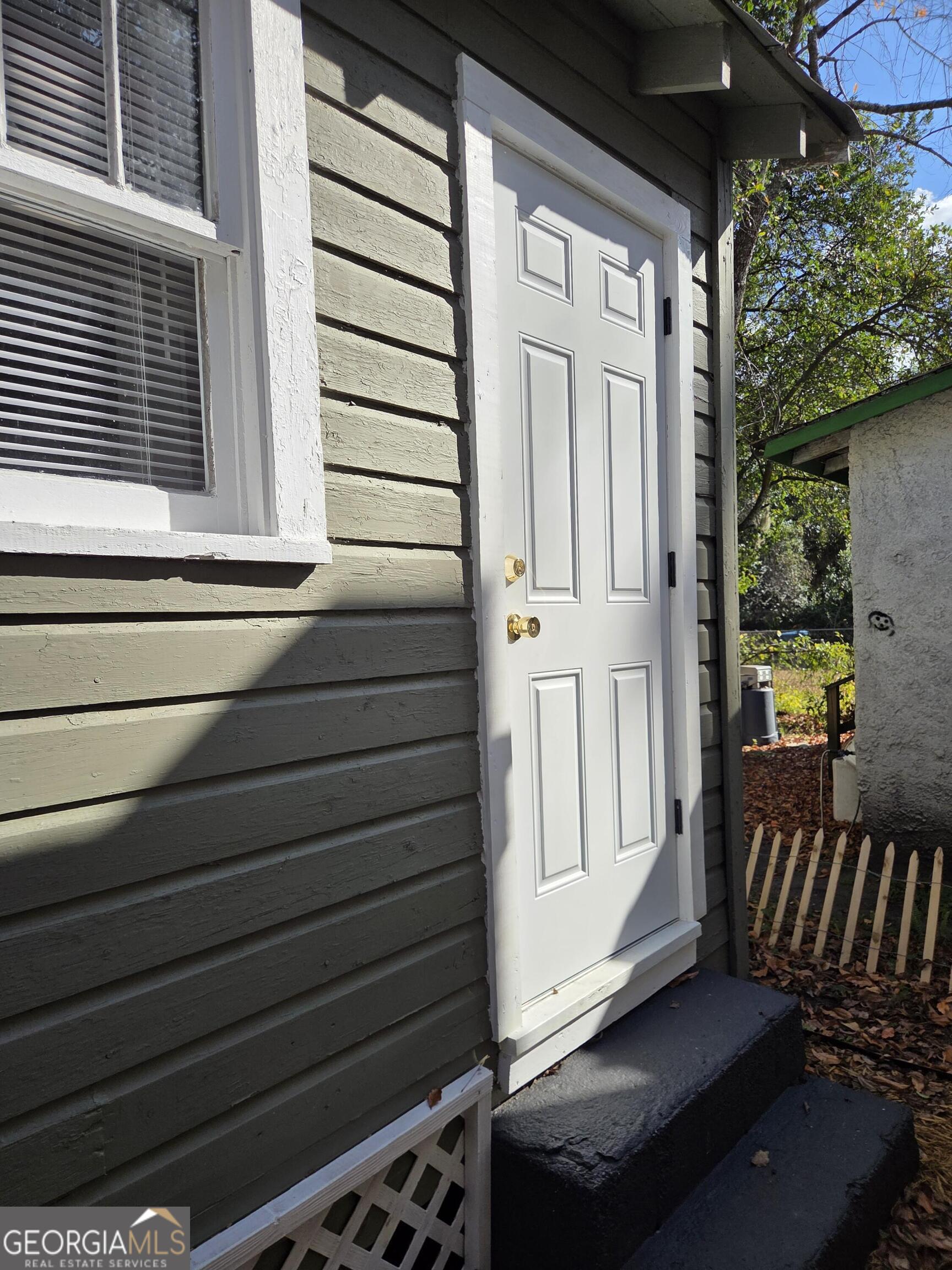 1502 Monck Street Brunswick, GA 31520 - Photo 28 of 32 a view of a house with a door