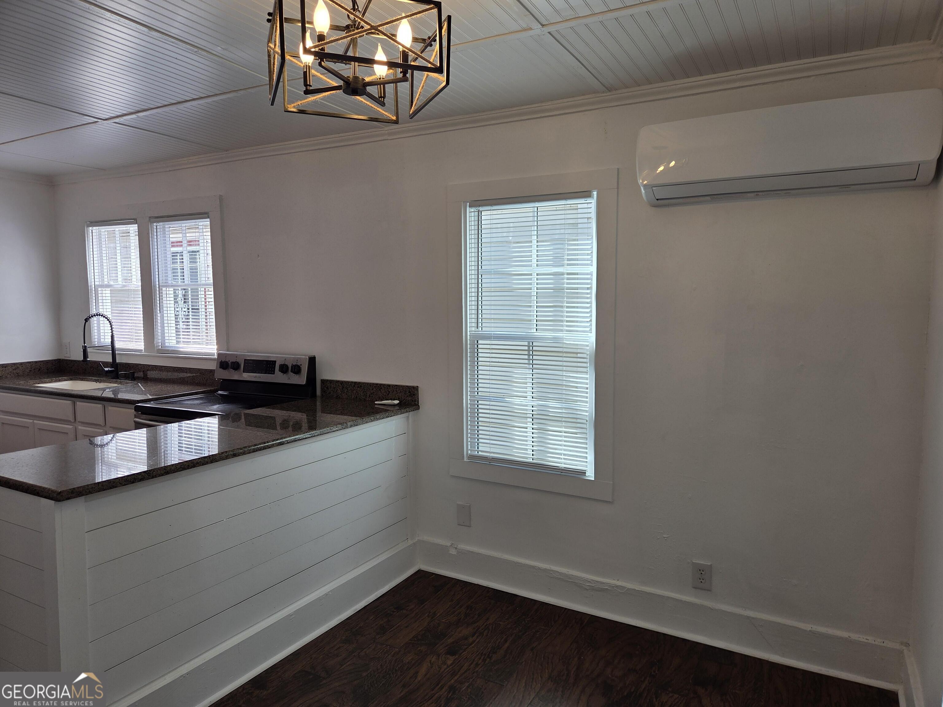 1502 Monck Street Brunswick, GA 31520 - Photo 7 of 32 a kitchen with a sink and a window