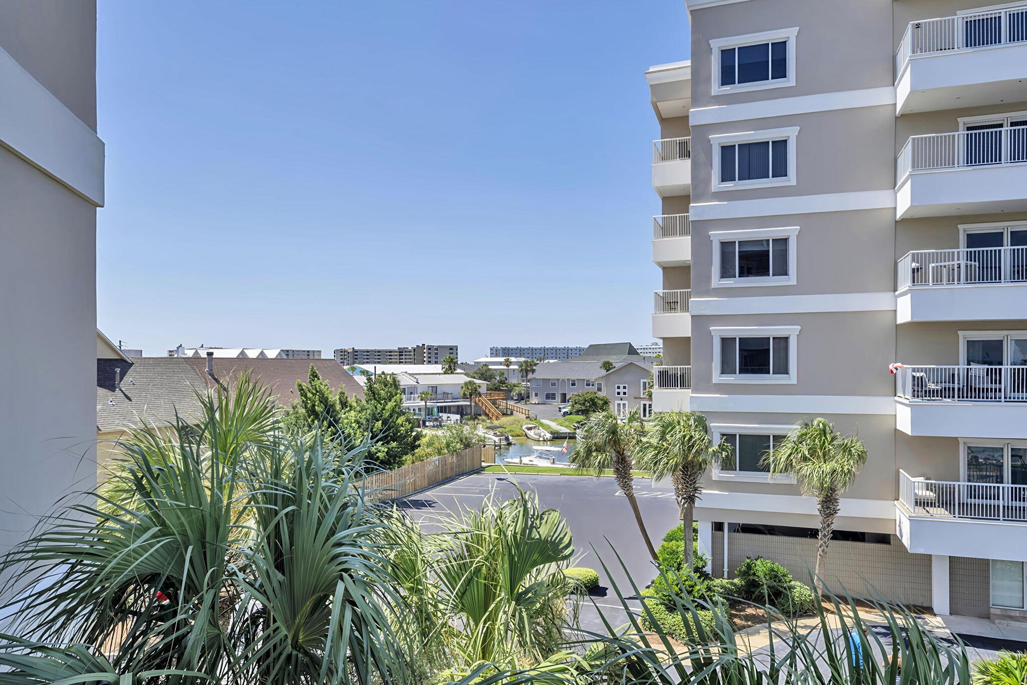 195 Durango Road, Unit 3A Destin, FL 32541 - Photo 16 of 41 a view of a yard in front of a building