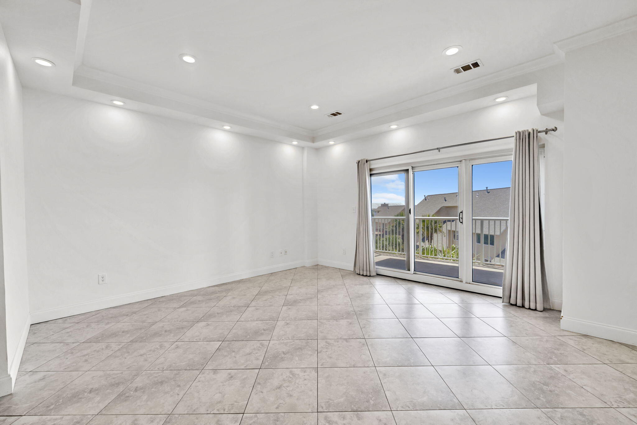 195 Durango Road, Unit 3A Destin, FL 32541 - Photo 25 of 41 a view of an empty room with a sliding door