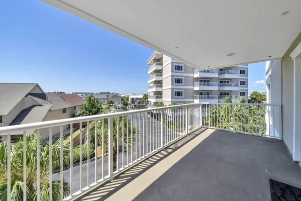a view of balcony with furniture